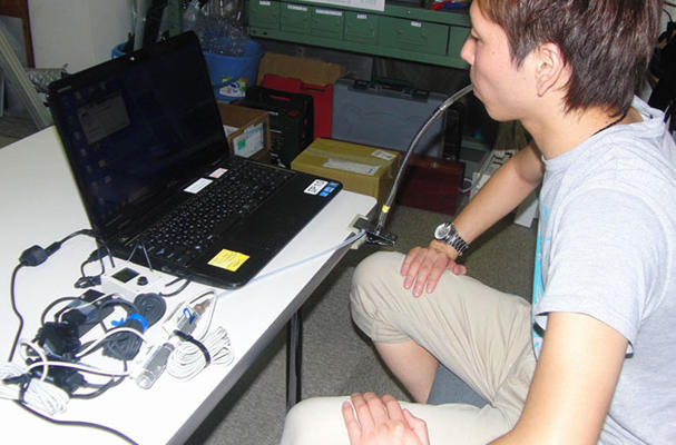 Kinki Univ. develops method to move computer mouse with breath (Source:The Asahi Shimbun)